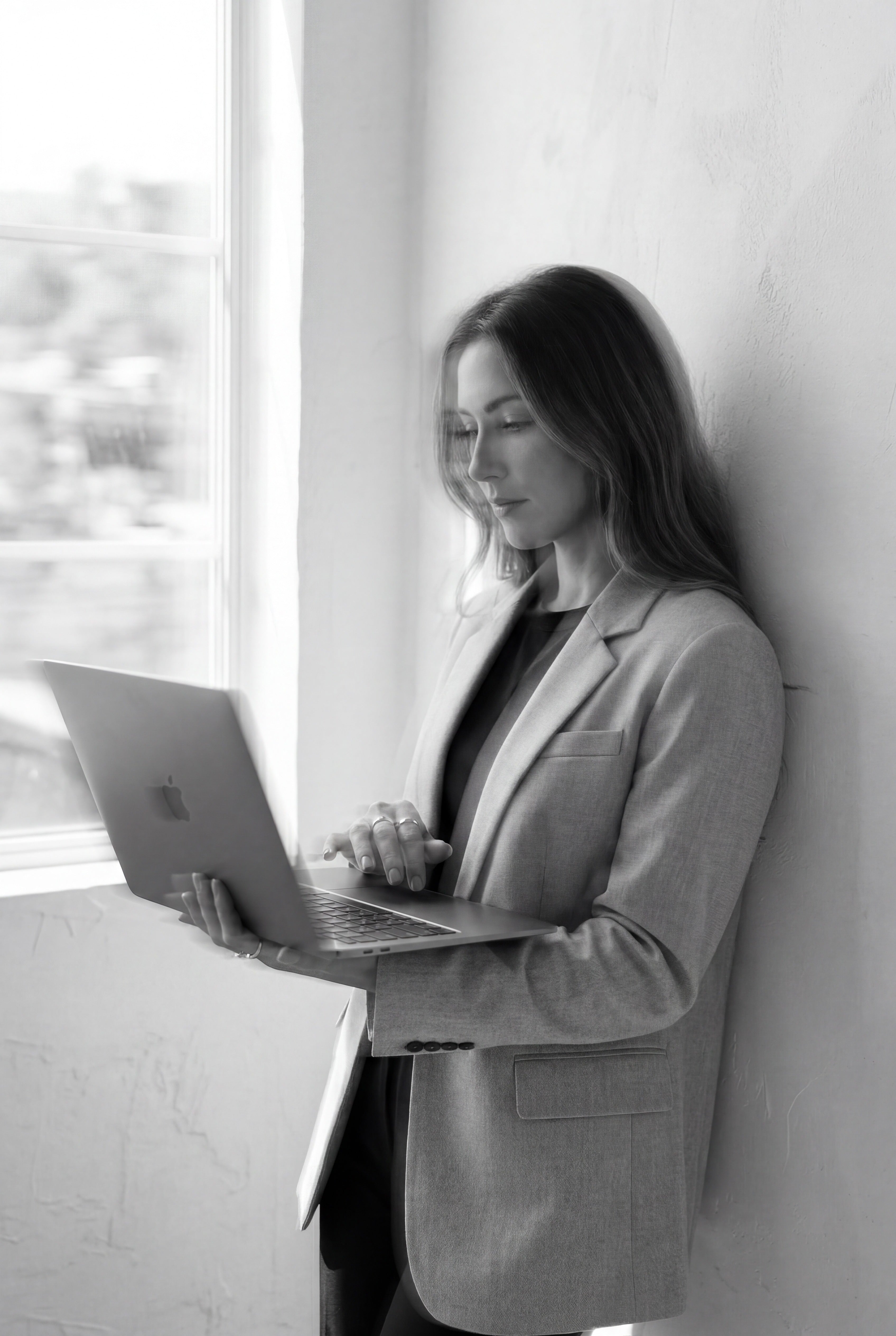 Woman holding a laptop