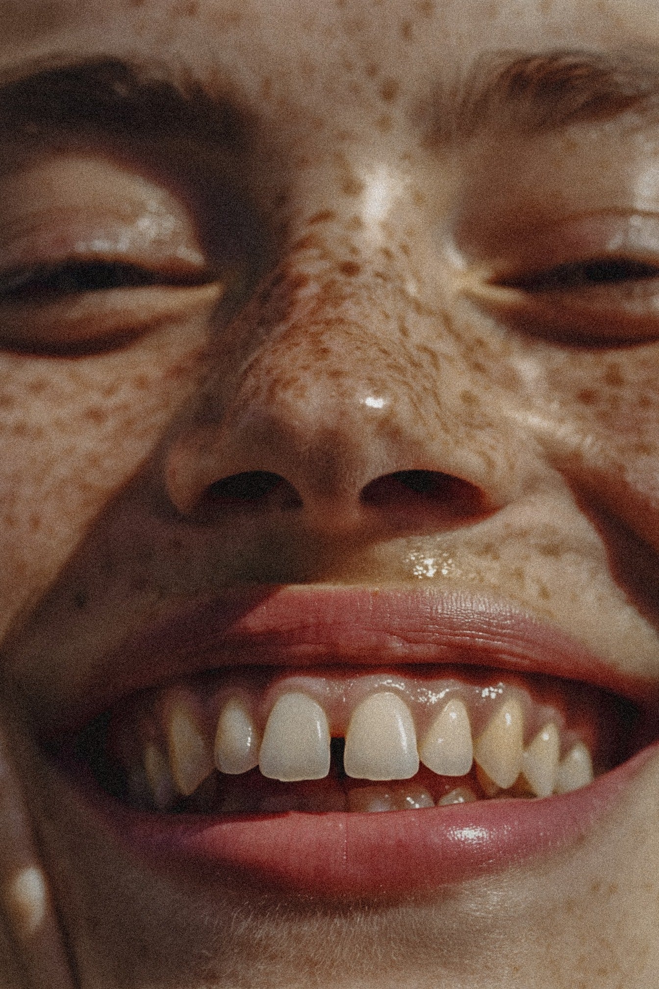 Close up of freckles smiling