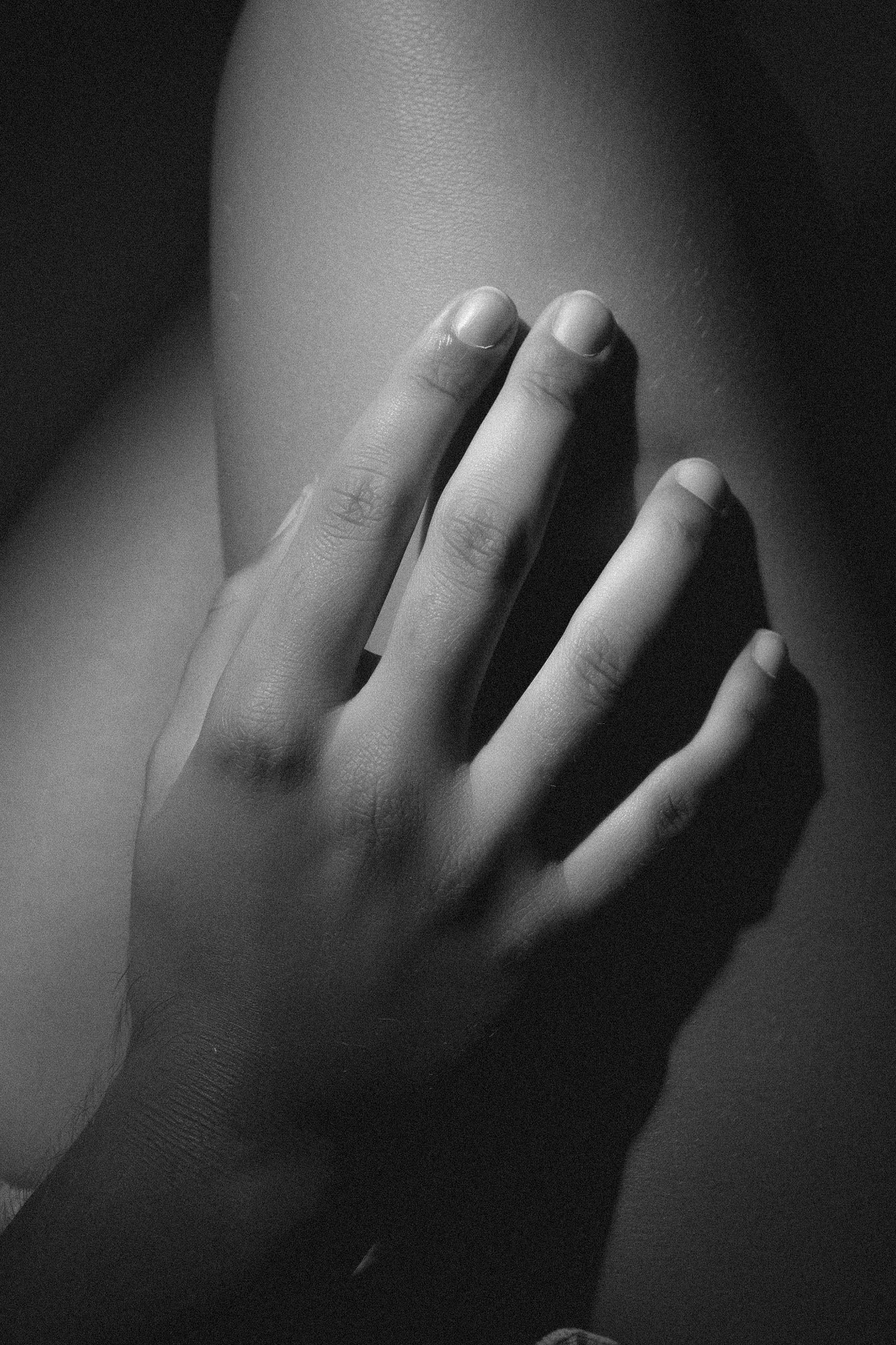 Woman with hand on herself